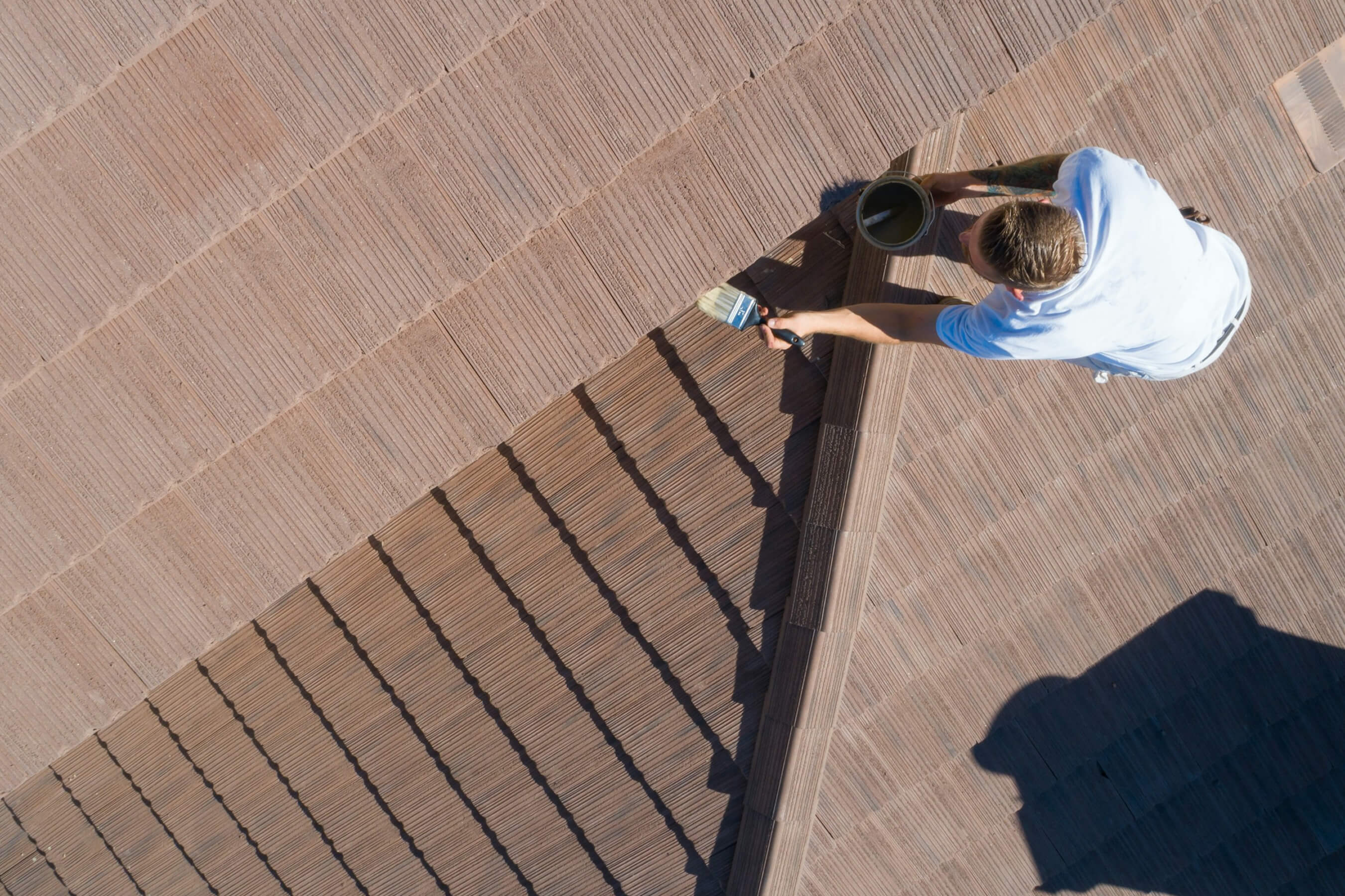 When to Call Painting Contractors for Roof Restorations